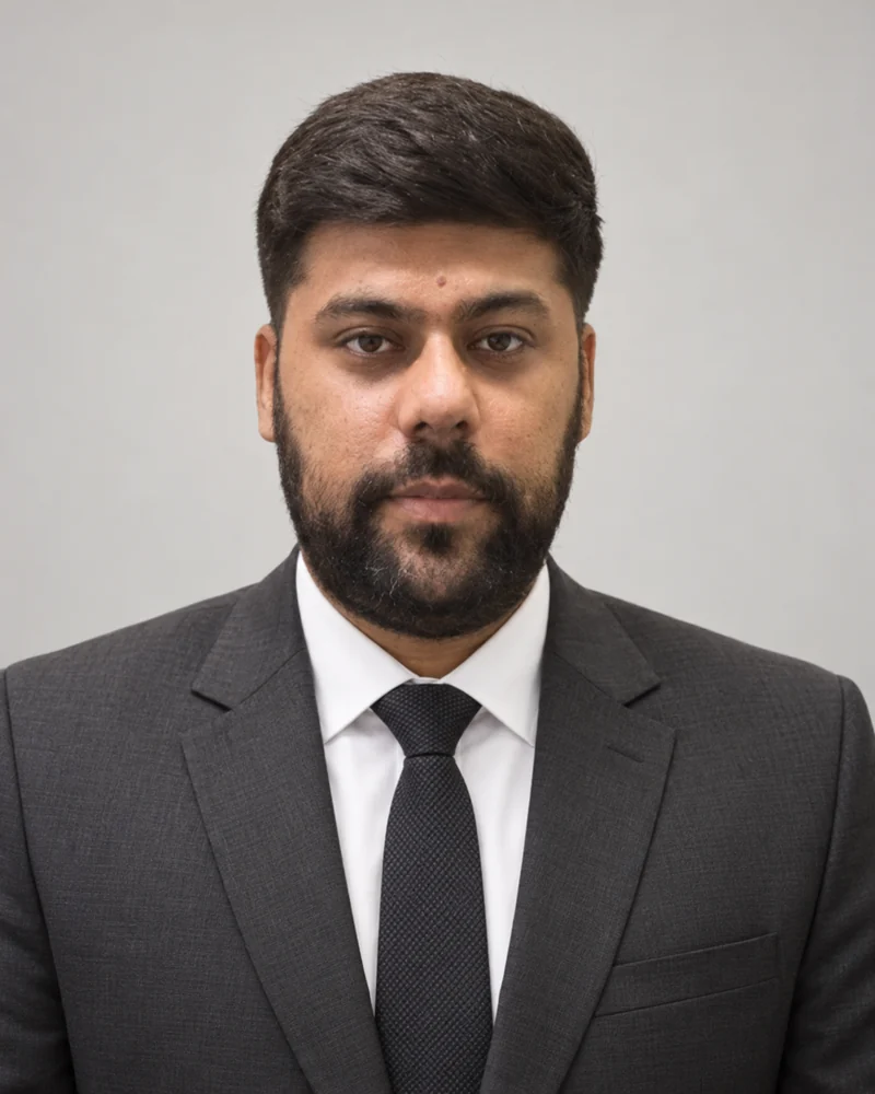 Abdul Haseeb in a charcoal suit